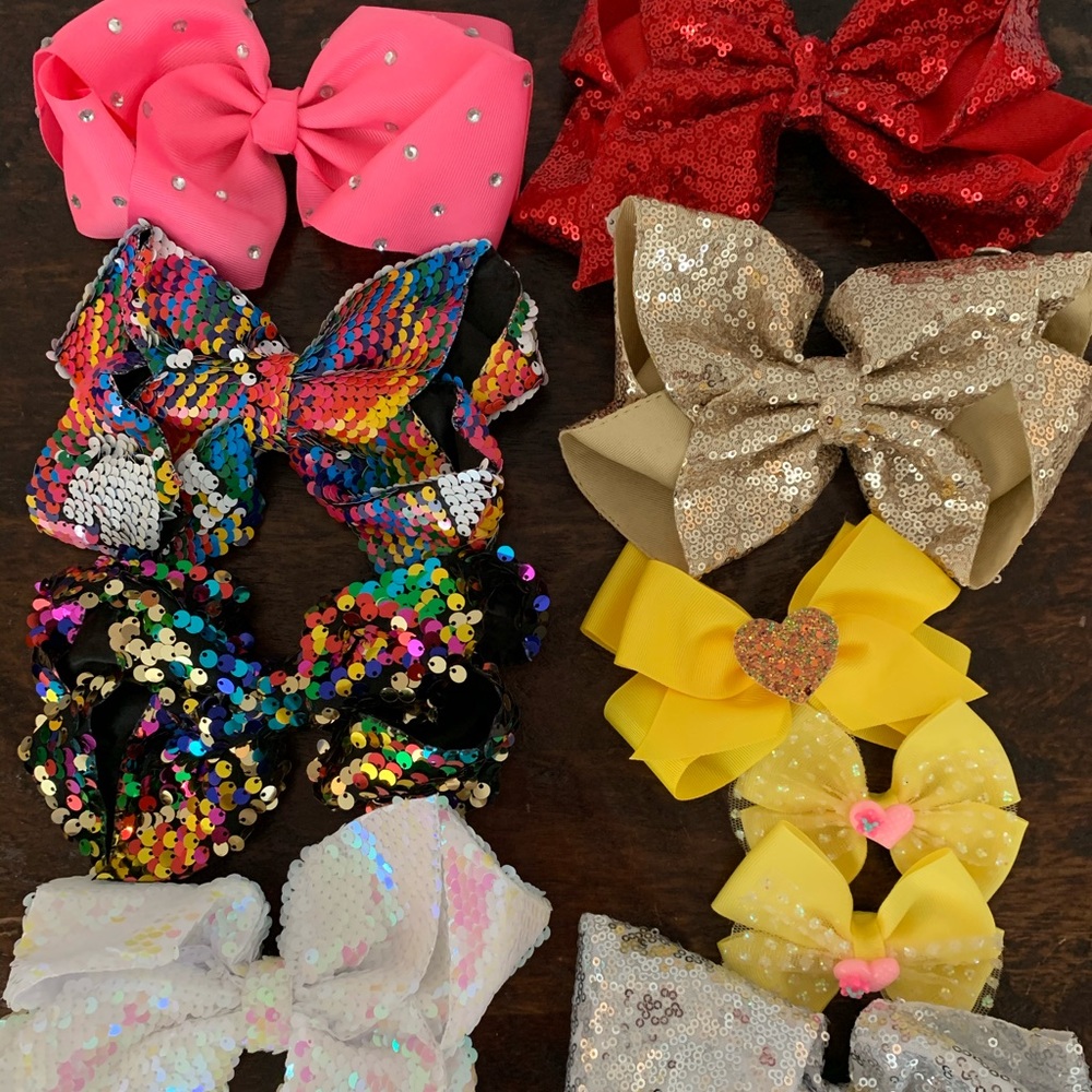 Multi pack (9) of JoJo Siwa bows and similar.